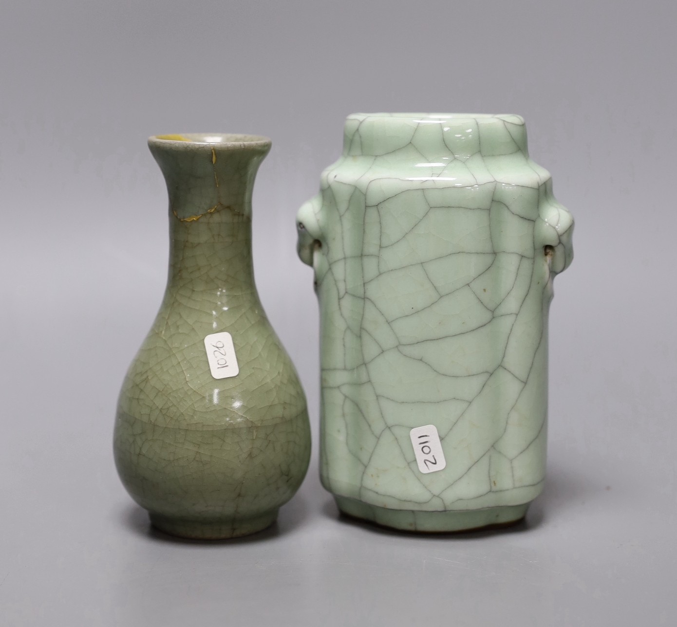 A Chinese celadon bottle vase, and a celadon crackle glaze vase, Yuan-Ming or later, 14cm